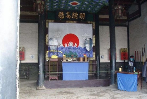 明镜高悬断伞的传说